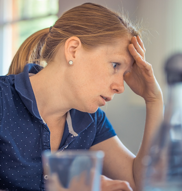 Woman frustrated at work, work sucks